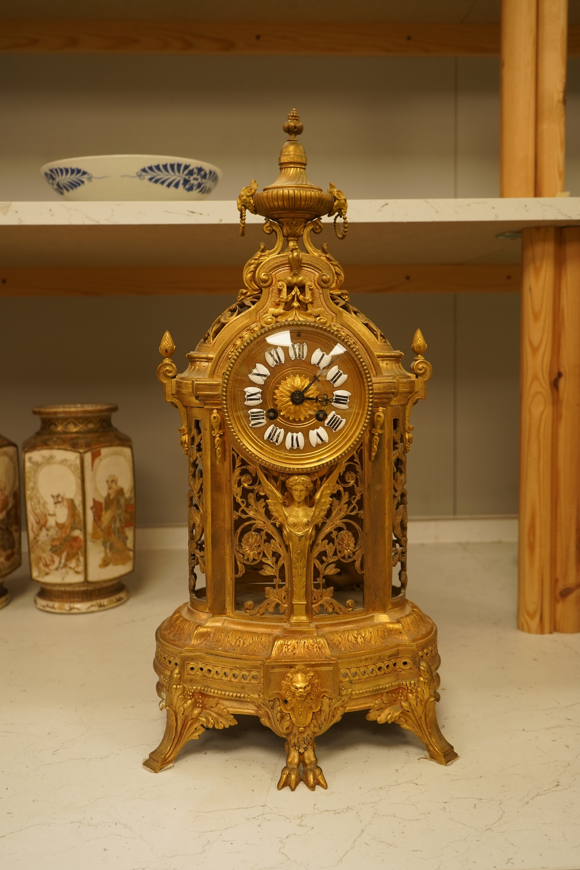 A Louis XIV style ormolu mantel clock, 54cm high